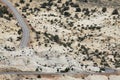 Road through barren desert elevated view Royalty Free Stock Photo