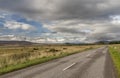 Road through beautiful landscape of cairngorms national park in