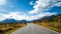 Road among the beautiful nature of the mountain and lake in Autumn on a sunny day. I Royalty Free Stock Photo