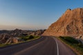 Road Bends Through Badlands Formations Royalty Free Stock Photo