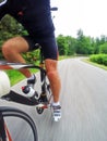 Road bike; male cyclist riding a racing bike downhill Royalty Free Stock Photo