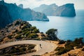 Road bikers on the road on Balearic Islands. Sea in Background. Cap de Formentor. Mallorca, Majorca, Spain Royalty Free Stock Photo