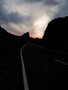 The road of black and white leading straight into the sunset, Tenerife, Canary Islands