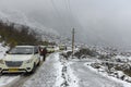 Road blocked due to heavy snowfall at Yumthang valley, sikkim and tourists walking on roads to see the condition