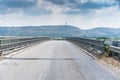 Road bridge with mountains