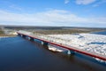 Road bridge over the Nadym river during the ice drift on Yamal in Russia