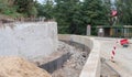 Road building . A newly constructed retaining wall protecting the hillside. Royalty Free Stock Photo