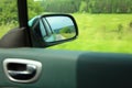 Road car rear view mirror motion blur background Royalty Free Stock Photo