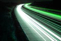 Road with car traffic at night with blurry lights Royalty Free Stock Photo