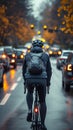 Road carriageway, cyclist shares space with moving cars, riding