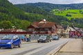 Road cars idyllic houses in town Fagernes Fylke Innlandet Norway