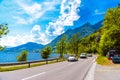 Road with cars near the lake with mountains, Alpnachstadt, Alpnach Obwalden Switzerland