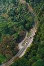 Road with cars running that view from Gondola lifts in the area of Sun Moon Lake Ropeway in Yuchi Township, Nantou County, Taiwan