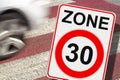 From road for cars to road for people - urban zone 30 concept with pedestrian crossing and car Royalty Free Stock Photo
