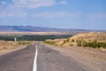 Road in Charyn national park in Kazakhstan. Clouds background. Beautiful sand stone formations. Soil errosion. Royalty Free Stock Photo