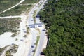 The road, the checkpoint divides the territory of Punta Cana, the Dominican Republic into two parts: a national park and the coast