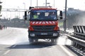 Road cleaning vehicle working