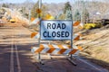 Road closed sign on the street barricade Royalty Free Stock Photo