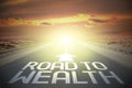 Highway/ road concept - road to wealth Royalty Free Stock Photo