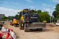 Road construction equipment at the construction site of the road overpass