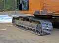 Road construction. Excavation. Lower rear of crawler excavator