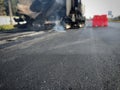 Road construction With the method of burning asphalt and mixing additional materials For improved maintenance