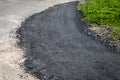 Road construction, new and old asphalt pavement Royalty Free Stock Photo
