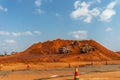 Road construction site with diggers and trucks, Mozambique