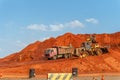 Road construction site with diggers and trucks, Mozambique