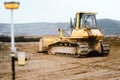 Highway and road construction site with motor grader, excavator and bulldozer working Royalty Free Stock Photo