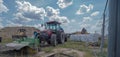 Poland Ostrowiec Swietokrzyski July 15, 2023 at 11:16 am. Large Casei tractor with sweeper.