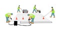 Road construction worker painting zebra crossing sign on city street . Technical road man workers. Royalty Free Stock Photo