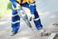 Road construction worker with perforator Royalty Free Stock Photo