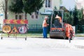 Road construction workers repairing the road Royalty Free Stock Photo