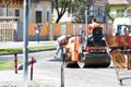 Road construction workers repairing the road