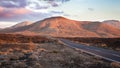 Road through corlorful volcanic landscape at sunset Royalty Free Stock Photo