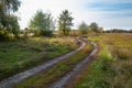 Road in the countryside on an autumn sunny day. Nature in the Kharkiv region Royalty Free Stock Photo