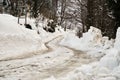 Road covered by snows, truck traces on road. Royalty Free Stock Photo