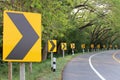 The road curve with street signs reflex light. Royalty Free Stock Photo