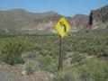 Road Curves Caution Sign in Arizona Desert Royalty Free Stock Photo