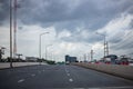 Road and dark cloudy sky