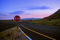 Road in the dawn against the blue sky in Turkey. Sunrise, field, mountains, trees in the morning in Cappadocia. Royalty Free Stock Photo