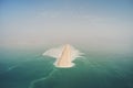 Road on Dead Sea surface. The southern part of the Dead Sea, is divided into pools from which extract minerals. shore is covered