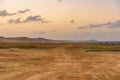 A dirt road in the desert