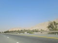 Road through the desert to the Moreeb dune in Liwa Oasis, Emirate of Abu Dhabi, UAE