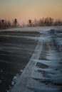 Road disappearing under blizzard conditions. Royalty Free Stock Photo