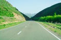 Road. Edge. Green Hill. Clear day. Mountains `Alatau`