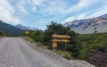 A road in El ChaltÃÂ©n city, and the signboard for the bikepath. Patagonia Argentina. Royalty Free Stock Photo