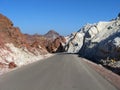 Road encircling Hormoz island, Iran. Incredible variety of rocks and minerals