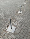 road fence with pool block flooring in the parking area of ??a building